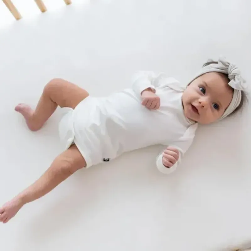 Shop All|Kyte Baby - Long Sleeve Bodysuit In Cloud - cutbabycare.com | baby boutique & care hub